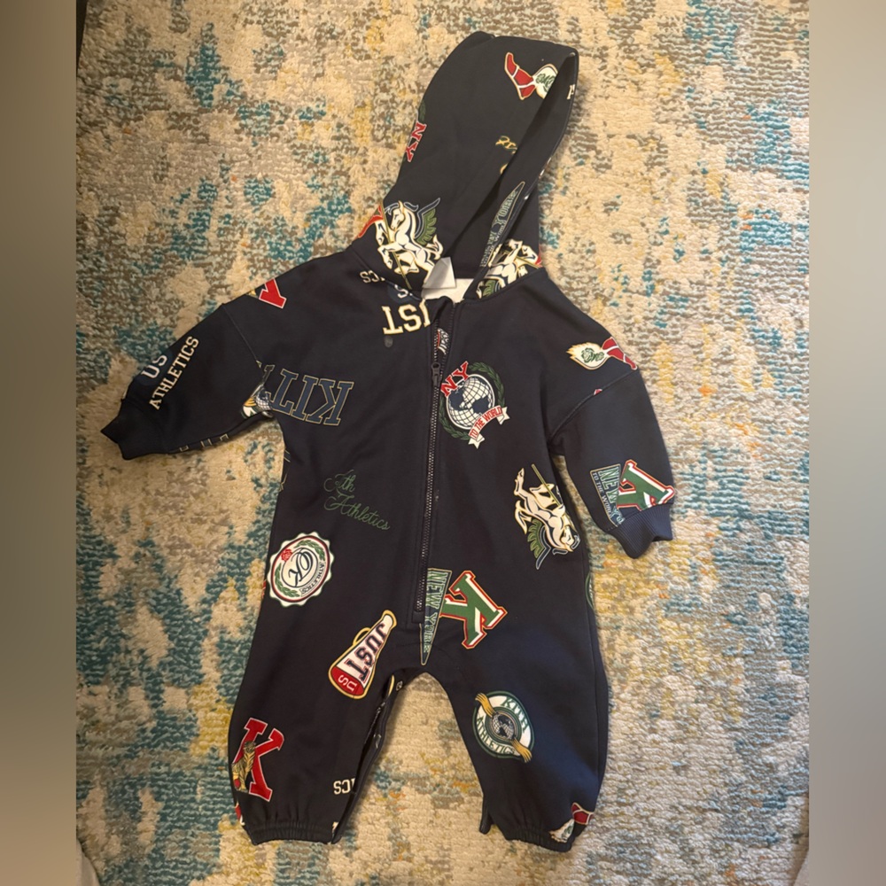 Kith Blue Footies One Piece with Vibrant Design